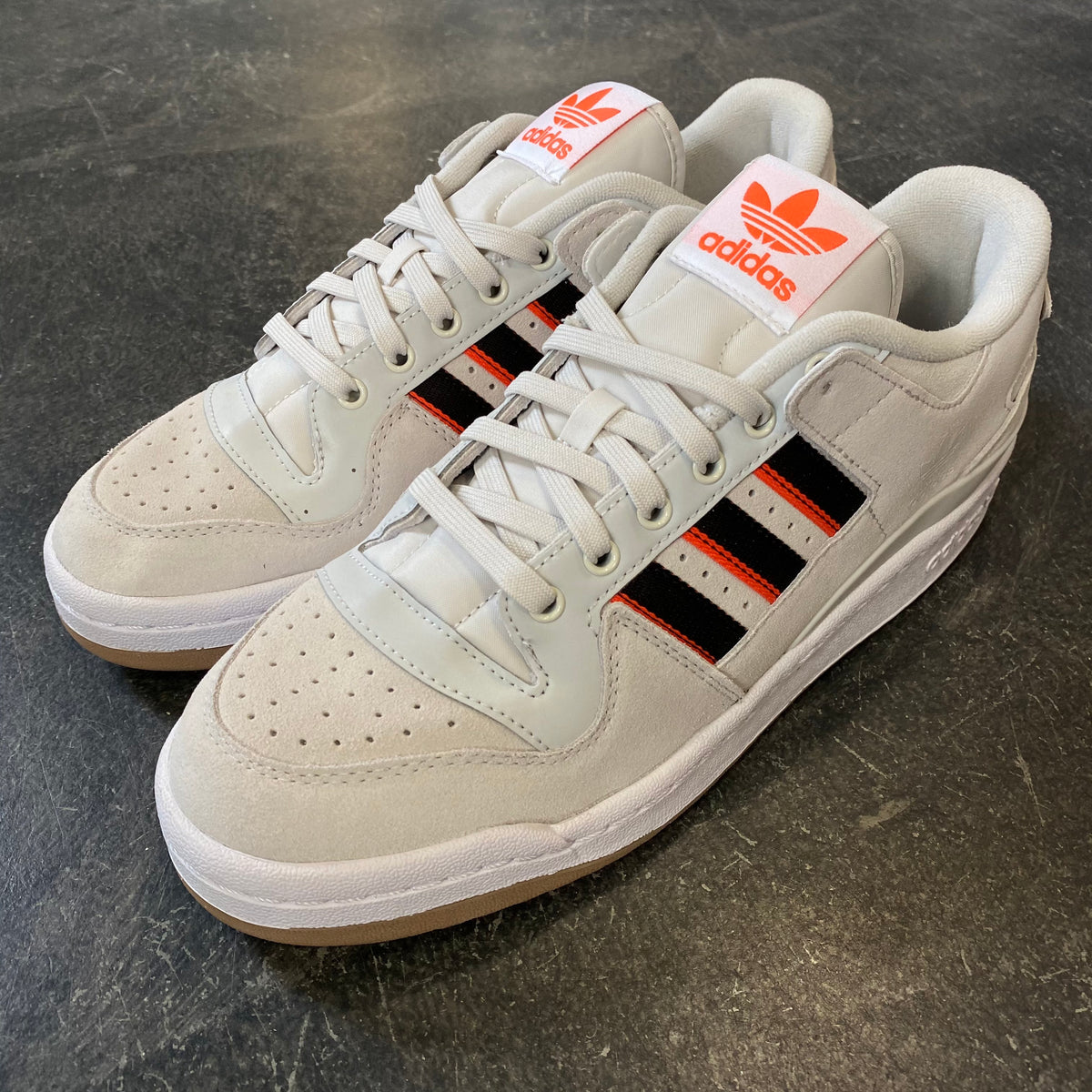 orange adidas forum low