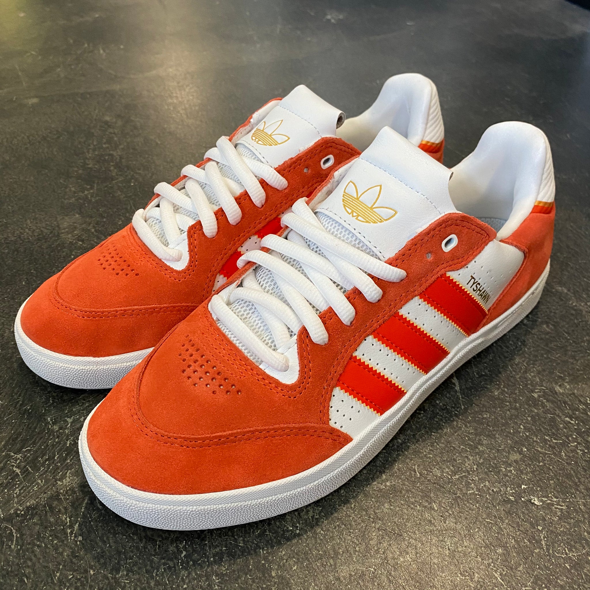Adidas white and orange sales