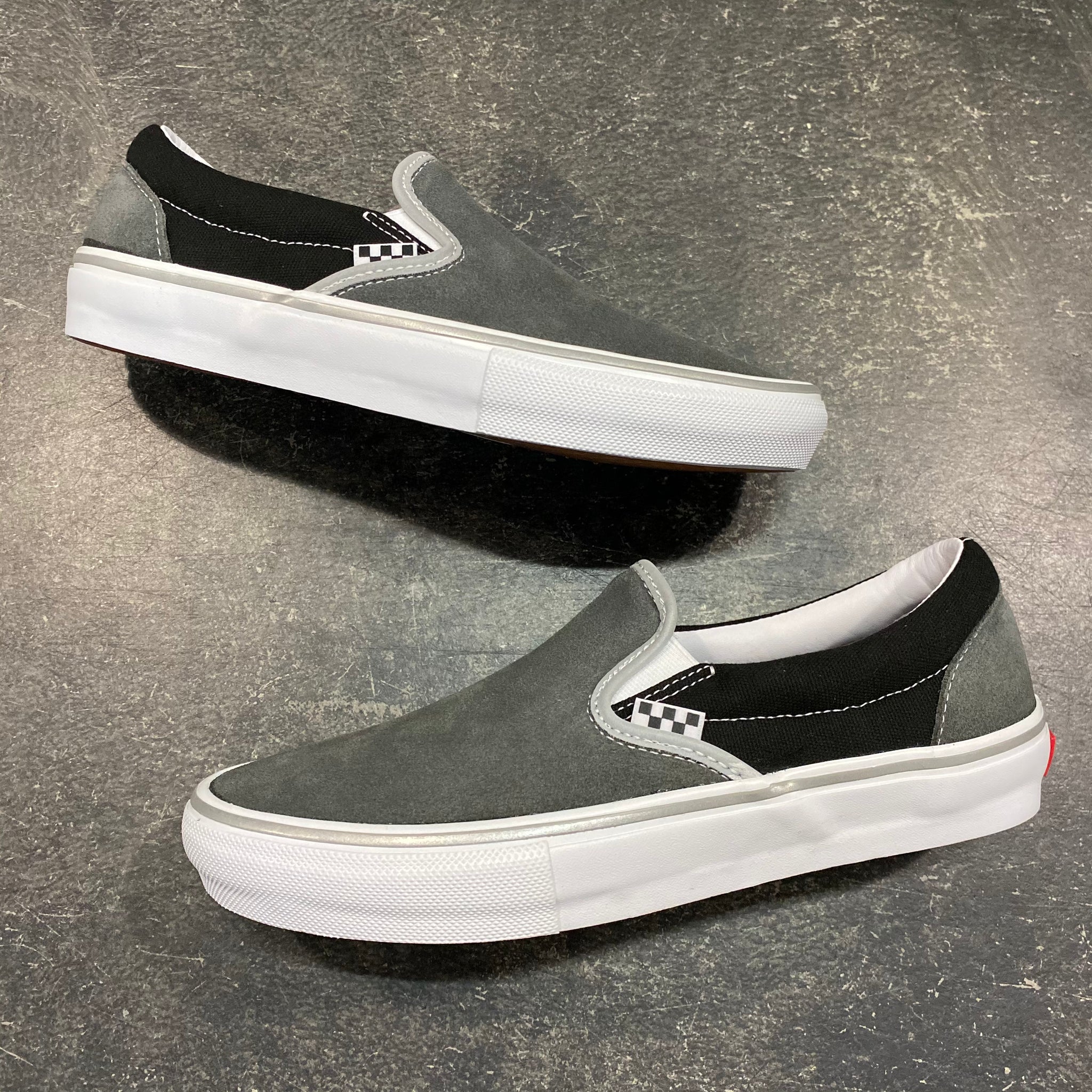 Slip on vans black and grey sales