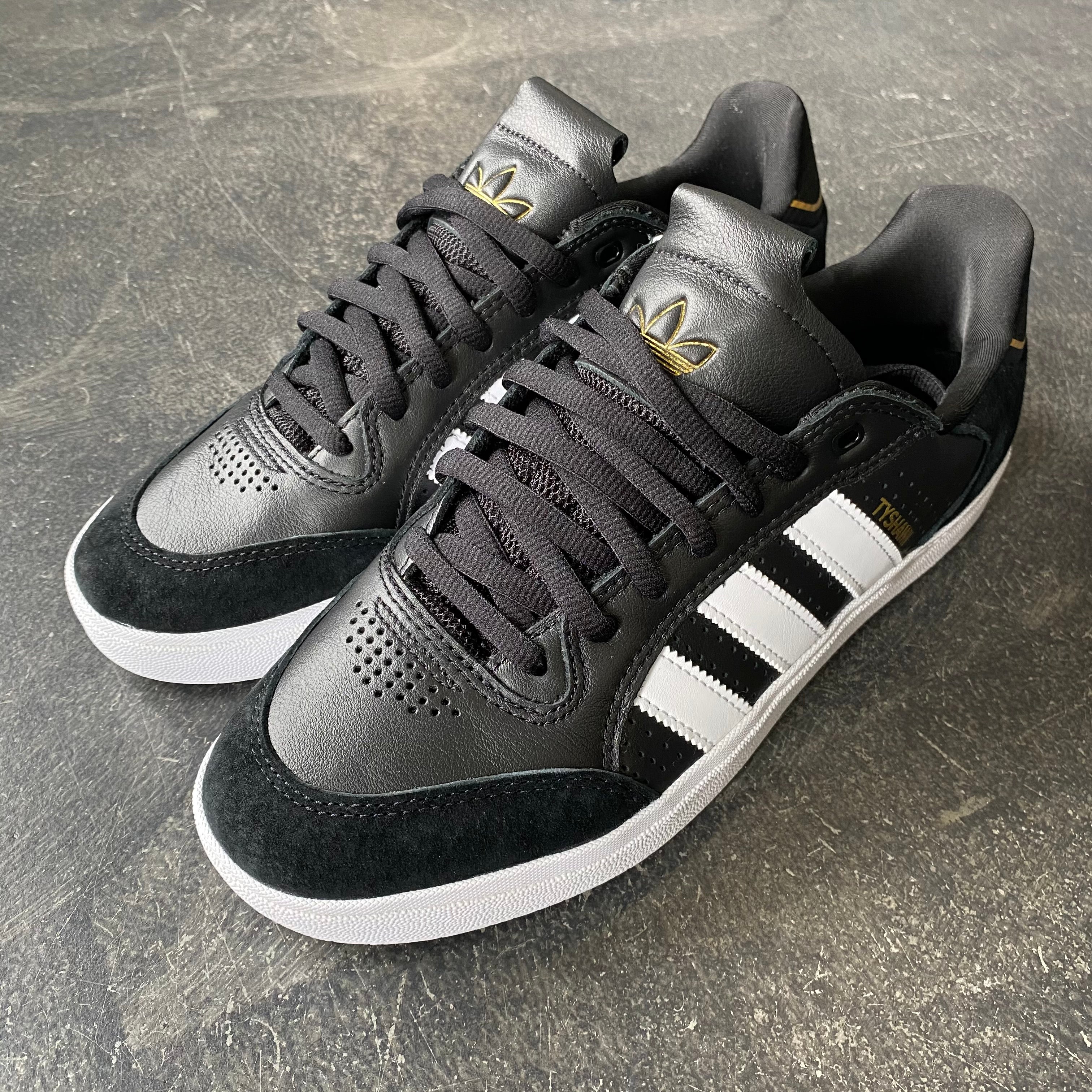 adidas mens black and white sneakers